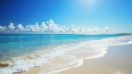 Fototapeta premium Serene Tropical Beach with Clear Blue Water and Soft White Sand