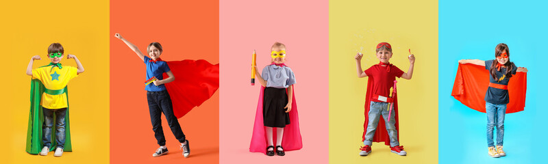 Set of different children dressed as superheroes on color background