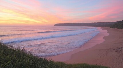 Serene Beach Landscape at Sunset with Pink and Orange Skies