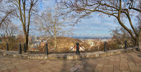 Panoramic View of Podil Kyiv – Scenic Cityscape from Hilltop Overlook with Historic Architecture, Urban Landscape and Cloudy Sky