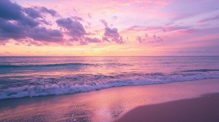 Obraz premium Serene Sunset Over Calm Ocean Waves and Soft Sandy Beach Shoreline