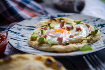Tortilla with egg and avocado, bullseye egg breakfest, bullseye egg food