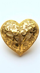 A gold-plated heart-shaped brooch with a delicate design against pure white background.