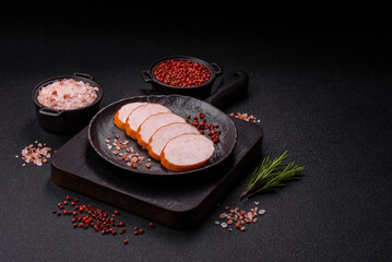 Delicious fresh ham cut into round slices with salt, spices and herbs