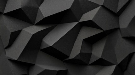 Textured black wall with geometric patterns showcasing angular shapes and contrasts in lighting and shadows