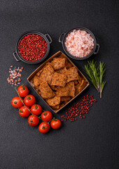 Crispy homemade brown bread chips with seeds and grains
