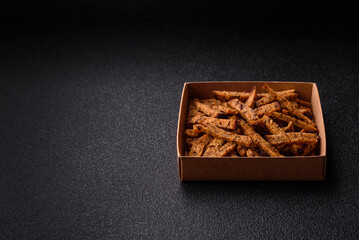 Crispy homemade brown bread crackers or croutons with seeds and grains