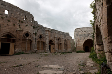 Syria Krak des Chevaliers castle on a cloudy summer day