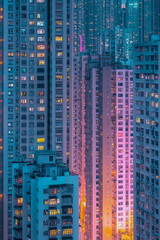 Obraz premium Colorful skyscraper facade in nostalgic vintage tones. Abstract cityscape with urban textures, modern high-rise patterns, and aesthetic retro architecture.