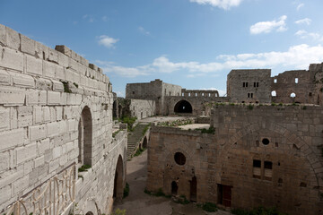 Syria Krak des Chevaliers castle on a cloudy summer day