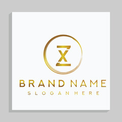 XZ letter mark and branding golden colour logo design with a leaf. And your best choice.	