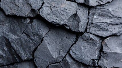 Dark grey rock texture, rugged surface, cliff face, natural background, design element