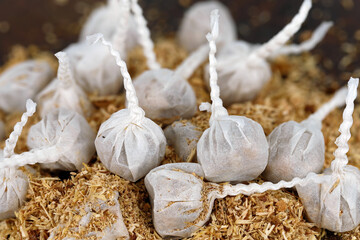 Close-up of white Fun Snaps or Devil Bangers, banging fun for kids on New Year's Eve, children's...