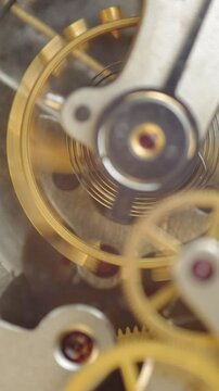 Cogwheels inside clockwork. Close-up. Concept Eternity, Teamwork , Idea Technology. Tick-Tick Sound