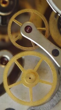 Cogwheels inside clockwork. Close-up. Concept Eternity, Teamwork , Idea Technology. Tick-Tick Sound