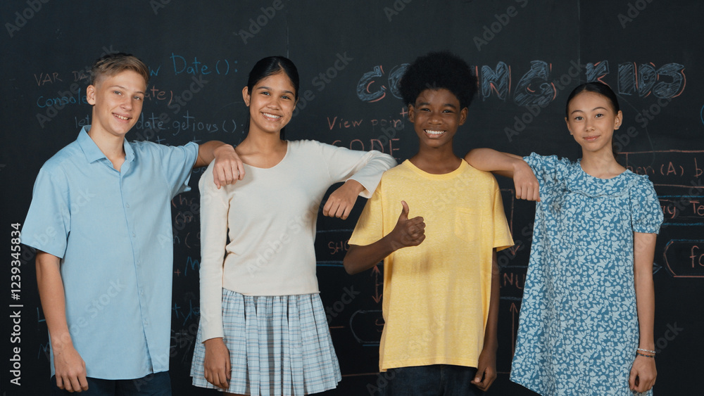 Poster group of smart multicultural teenager looking at camera at blackboard. happy diverse children standi