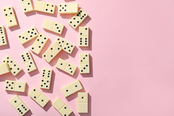White dominos blocks on pink background