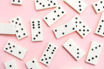 White dominos blocks on pink background