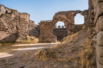 Interior ruin in stone walls of Mourão castle with stairs and turrets, Alentejo PORTUGAL © Liliana