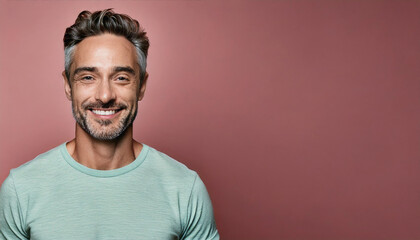 Obraz premium Handsome Smiling Man in Studio Portrait with Charming Look, Pastel Background, copyspace 