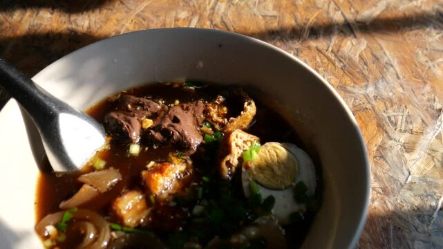 rolled rice noodles in five-spices broth (Kuay Jap), Thailand