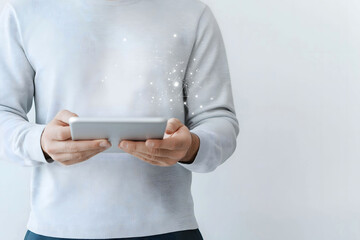 Person holding a digital tablet with glowing futuristic graphics, ideal for technology concepts, innovation themes, digital communication, modern business projects, or creative tech-related visuals