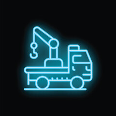 Blue neon tow truck sign glowing on a dark background