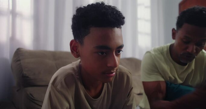 Father mocking teenage son&rsquo;s past behavior during a difficult conversation, highlighting emotional disconnect and struggles in parenting and communication in family dynamics