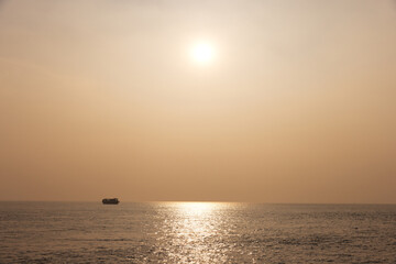 A boat sailing at Sundarban tiger reserve during dusk, India