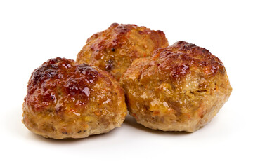 Baked pork meatballs, isolated on white background.