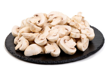 Sliced champignons, close-up, isolated on white background