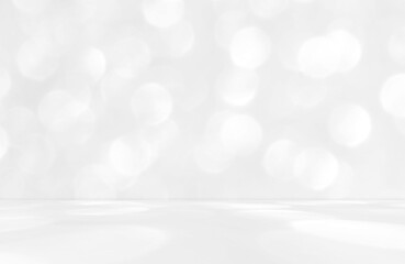 Gray silver white bokeh background. Empty room studio for product presentation. Sunlight effect shadow of nature bokeh on the wall and floor. Summer or spring backdrop concept. © Maliflower73
