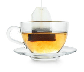 Cup with teabag isolated on white. Brewing aromatic tea