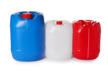 Three colorful plastic canisters isolated on white