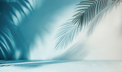 Minimalist simple background for design with beautiful light shadow from palm leaves on wall, gentle calm pastel muted shades of blue and beige with smooth color transition.