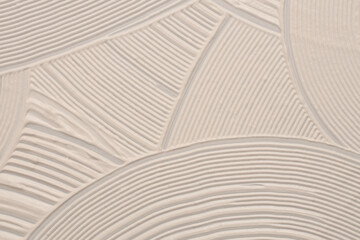 Abstract white beige color modeling clay and acrylic line wave painting wall. Canvas relief hand...