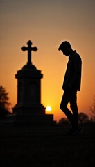 Fototapeta premium Silhouette of a person in reflection against a sunset cross