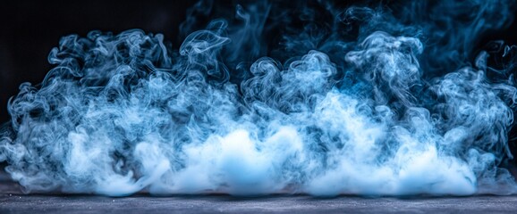 Blue smoke effect on dark background; design, VFX