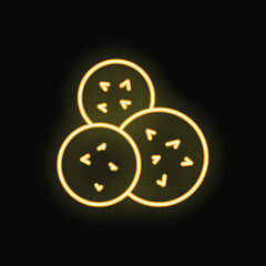 Yellow neon icon of three cookies with chocolate chips glowing on a black background