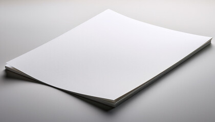 a single blank page lying flat captured from a straight on angle isolated