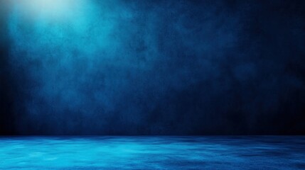 A dramatic blue background with soft lighting, ideal for presentations and creative designs.