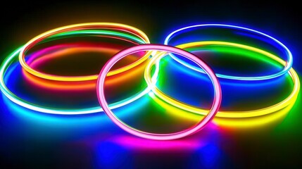 Colorful Neon Glow Sticks in a Dark Space for Fun and Celebration