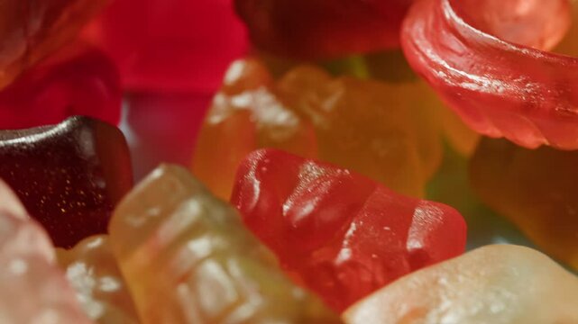 Jelly marmalade cola bottle bear close up, Confiture Bean candy jujube Marmalade bears with cod cannabis close up. 