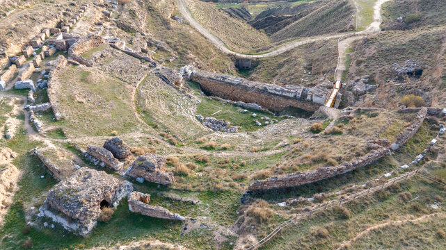 Aerial View of the Ancient Ruins of Augusta Bilbilis in northern Spain on Grassy Hillside