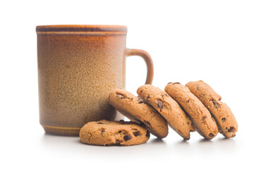 Chocolate chip cookies and mug  isolated on white background.