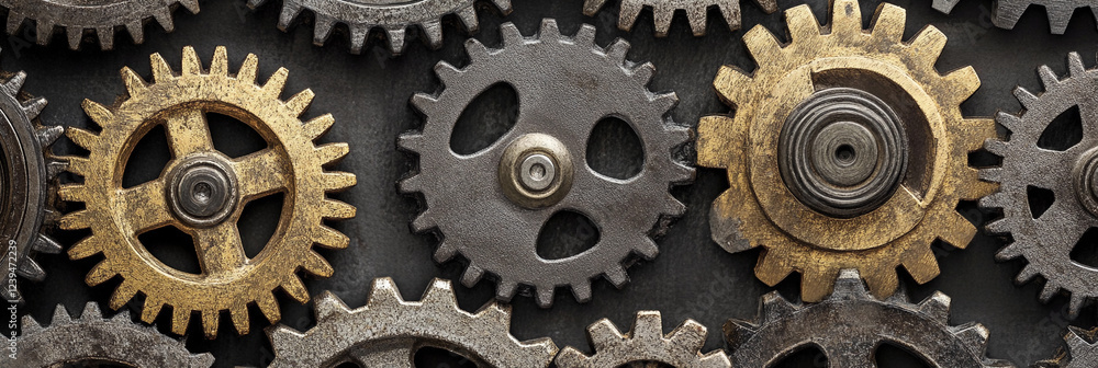 Poster intricate arrangement of gears in various colors and sizes