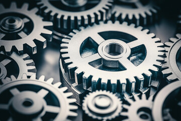 Metal gears interlocked in intricate arrangement for machinery