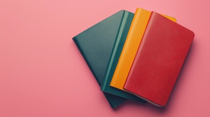Fototapeta premium A set of vibrant passports in different colors stacked together, symbolizing international travel, visas, and global mobility.