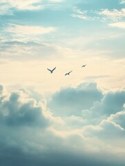 Fototapeta premium Birds soar through soft clouds in a serene sky during a tranquil afternoon. Generative AI