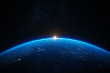 Stunning view of earth from space with rising sun at horizon